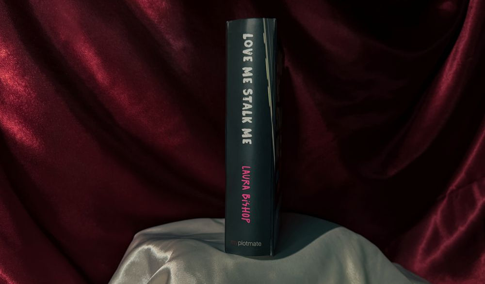 The spine view of the Callahan book box
from the dark romance book Love Me Stalk Me by Laura Bishop.