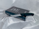 The silicone knife toy for Pretty Little Fears by S.J. Ryder on its book-like package.