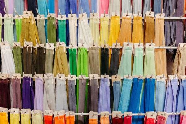 Multiple color samples of fabric used for toy packaging.